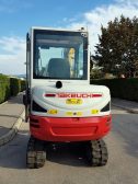 Takeuchi_bager_Terex_i_AUSA_dumper